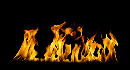 Bright realistic fire flames rising on black background. Perfect for energy, heat, or danger concepts, this burning flame texture adds intensity and power to design, advertising, or creative projects.