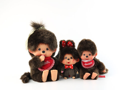 Tokyo Japan 11 October 2025, popular classic plush doll toy , Monchichi or Monchhichi , Japanese cute black monkey fur doll display on white shelf background in souvenir tourist shop in Japan doll