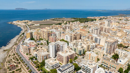 Aerial view of the archaeological site of Lilibeo (Lilybaeum for the Romans), located near Marsala, Sicily, Italy. In foreground are the buildings of the town and in background are the Egadi Islands.
