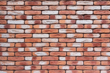 A colorful red brick wall