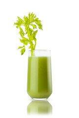 Green fresh vegetable juice in glass with celery sprig garnish, isolated, white background. Healthy vitamin cocktail for detox antioxidant diet program, fitness meny, wholesome homemade cuisine.