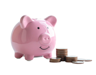 A cute pink piggy bank sits next to a pile of coins on a black background, representing saving and finance