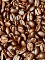 Close-Up View of Rich Dark Roasted Coffee Beans with Glossy Surface Captured in Natural Light for Coffee Lovers