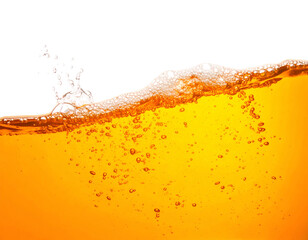 Amber liquid with dynamic bubbles and foam, against black