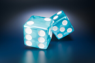 Two translucent blue dice are resting on a dark, reflective surface