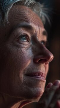 Contemplative Gaze: A close-up portrait of a mature woman with gentle eyes, lost in thought. Reflecting a moment of quiet introspection and deep contemplation.