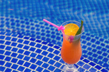 Beautiful cocktail by the pool. Selective focus.