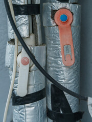 Insulated Pipes with Control Valves and Electrical Wiring