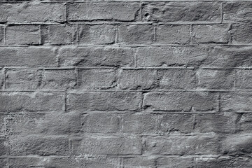 Rough gray painted brick wall for vintage architecture and design texture concept