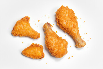 Crispy Fried Chicken Drumsticks & Pieces on White Background | Delicious Golden Brown Breaded Chicken | Food Photography | Poultry Meal