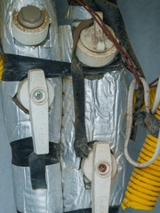 Insulated Pipes with Control Valves and Electrical Wiring