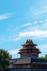 The beautiful reflection of the Forbidden City corner tower in the water