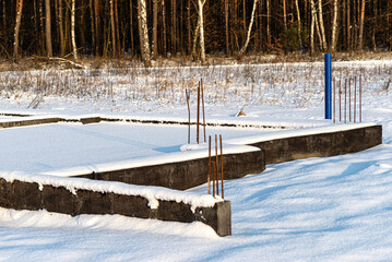 Insulated foundations and painted with dispersion, visible rods.