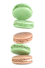 Sweet dessert composition: levitation of pastel macarons isolated on transparent background.