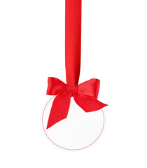 Blank white tag with with red border, red ribbon and red bow hanging isolated on white background with clipping path. Holiday Sale Concept. Design element.