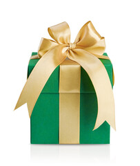 Green gift box wrapped in green paper and decorated with gold ribbon and bow isolated on white background with clipping path. Christmas, Valentines Day or Birthday celebration themes. Design element.