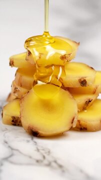 Artful Galangal Slices on Polished Marble A Slowly Rotating Culinary Vision