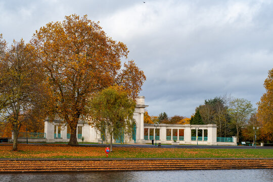 A riverscape view with trees in autumn color over the river Trent in Nottingham, UK.