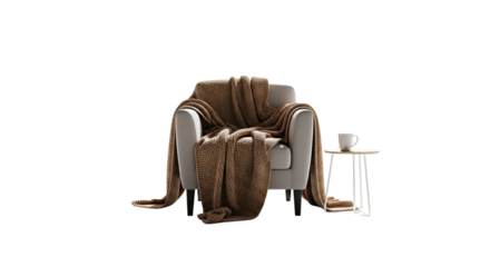 Cozy armchair draped with warm blanket and cup on side table, transparent background  