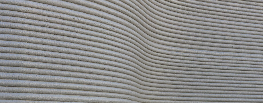 3D Printed concrete texture. architectural background. modern construction of 3D houses. printed house using a 3D printer