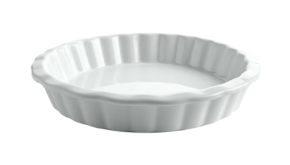 White pie dish with fluted edges, isolated on black background