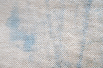 藍染液でムラができたアートな柄のキャンバス生地背景素材