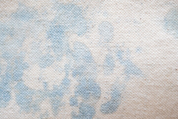 藍染液でムラができたアートな柄のキャンバス生地背景素材