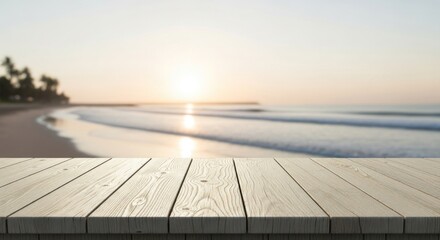 Wooden table in foreground with blurred tropical beach and ocean at sunset.