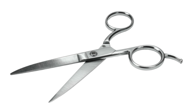 Open, shiny metal scissors against black background