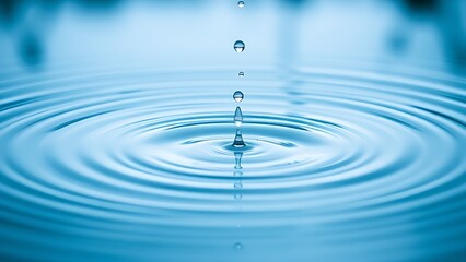 shrinkage. Raindrops creating circular ripples on a calm water surface, serene blue tones. ESG reports, sustainability campaigns, designed for environmental awareness campaigns.