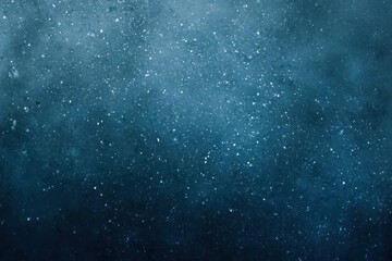 Obraz premium Abstract textured background with subtle shimmering light effects in deep blue and teal tones