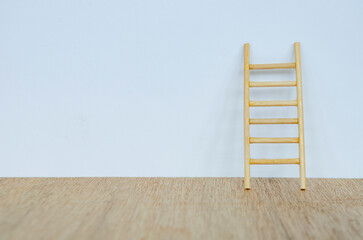 Small ladder on white cover background with customizable space for text.