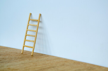 Side view of ladder on white cover background with customizable space for text.