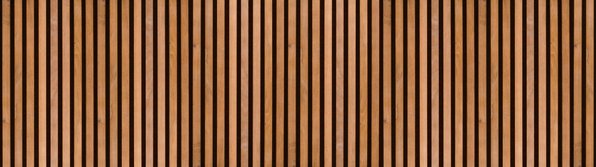 Wood background banner panorama long - Brown wooden acoustic panels wall texture , seamless pattern, vertical