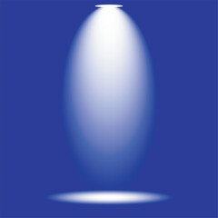 A single spotlight beam shines brightly against a deep blue background