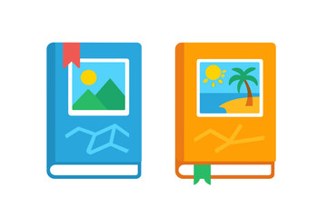 Pair of blue and orange books with scenic covers representing travel and memories
