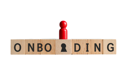 Wooden blocks spelling "ONBOARDING" with a red figure on the "key" block
