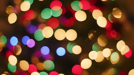 Dynamic display of blurred shimmering lights, offering a vibrant, joyful holiday season ambiance