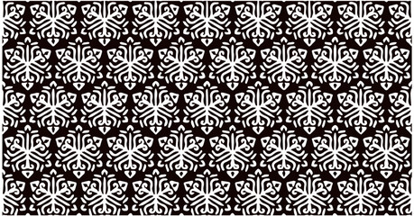 Elegant black and white floral ornamental seamless pattern with intricate symmetrical motifs for luxury design.
