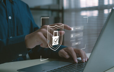 Cybersecurity and online data protection concept with person logging into laptop using secure authentication. Modern digital privacy, password security, and internet safety for business technology.