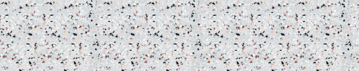 Modern terrazzo surface texture with small stone chips in warm beige, black, and white tones on...