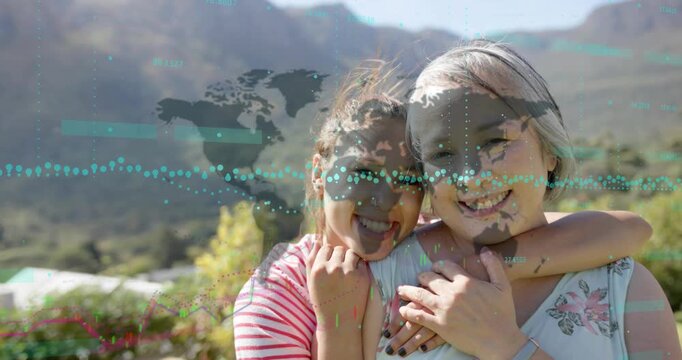 Mother and daughter hugging as world map fading sparking financial charts mapping market trends