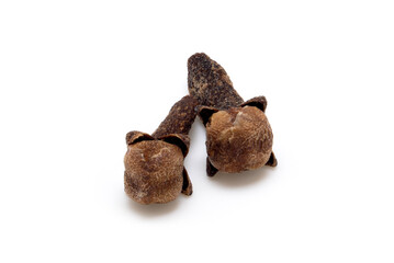 Dried whole cloves pair isolated on white, aromatic spice closeup