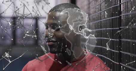 Standing padel athlete in red shirt gazing court sparking rotating tech globe overlay mapping flow - Powered by Adobe