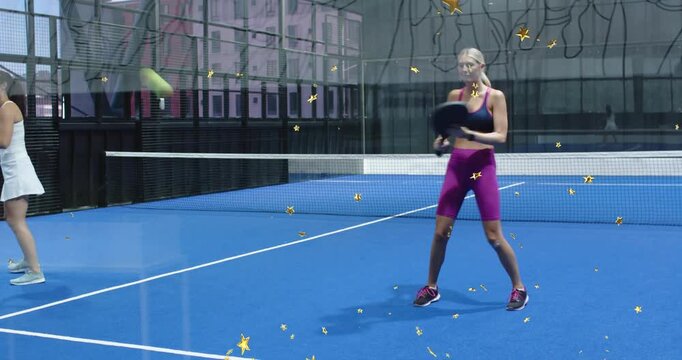 Blonde athlete practicing sports rally receiving lob shot, executing strokes on paddle tennis court
