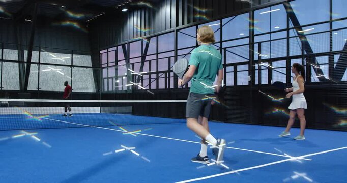 Male player initiating warmup bounces then tracking coach feed and practicing serve on padel court