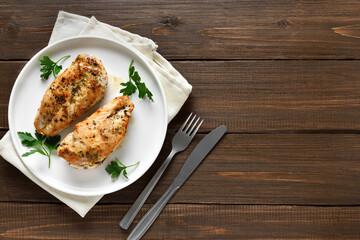 Roasted chicken breast on plate