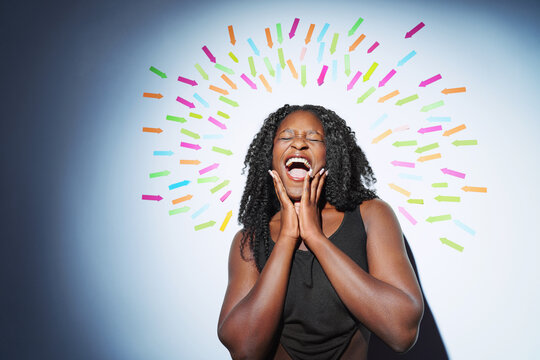 Portrait of a screaming woman at the center. Arrows in the background point towards the woman. social media addiction, communication concept.