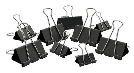 Assortment of black office binder clips scattered across a dark surface