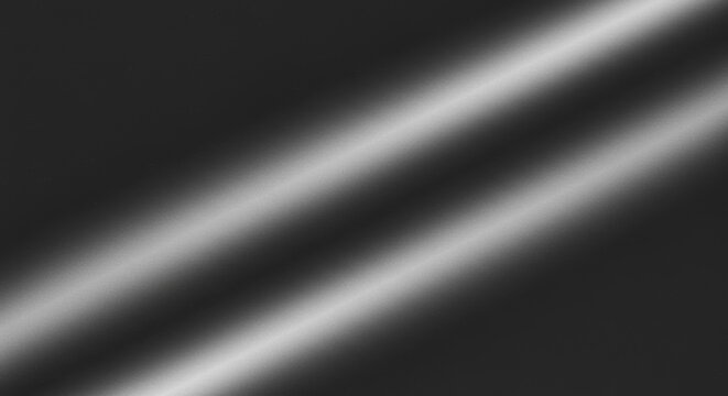 Sleek Metallic Grey Background with Radiant Diagonal Light Streaks